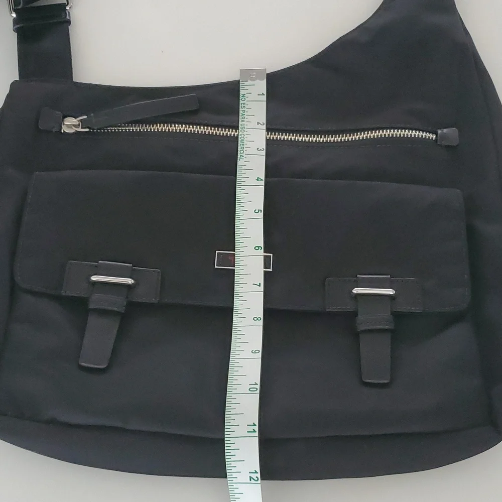 Tumi Pucket E/W Flap Crossbody Messenger Bag in Black/Silver/Leather…